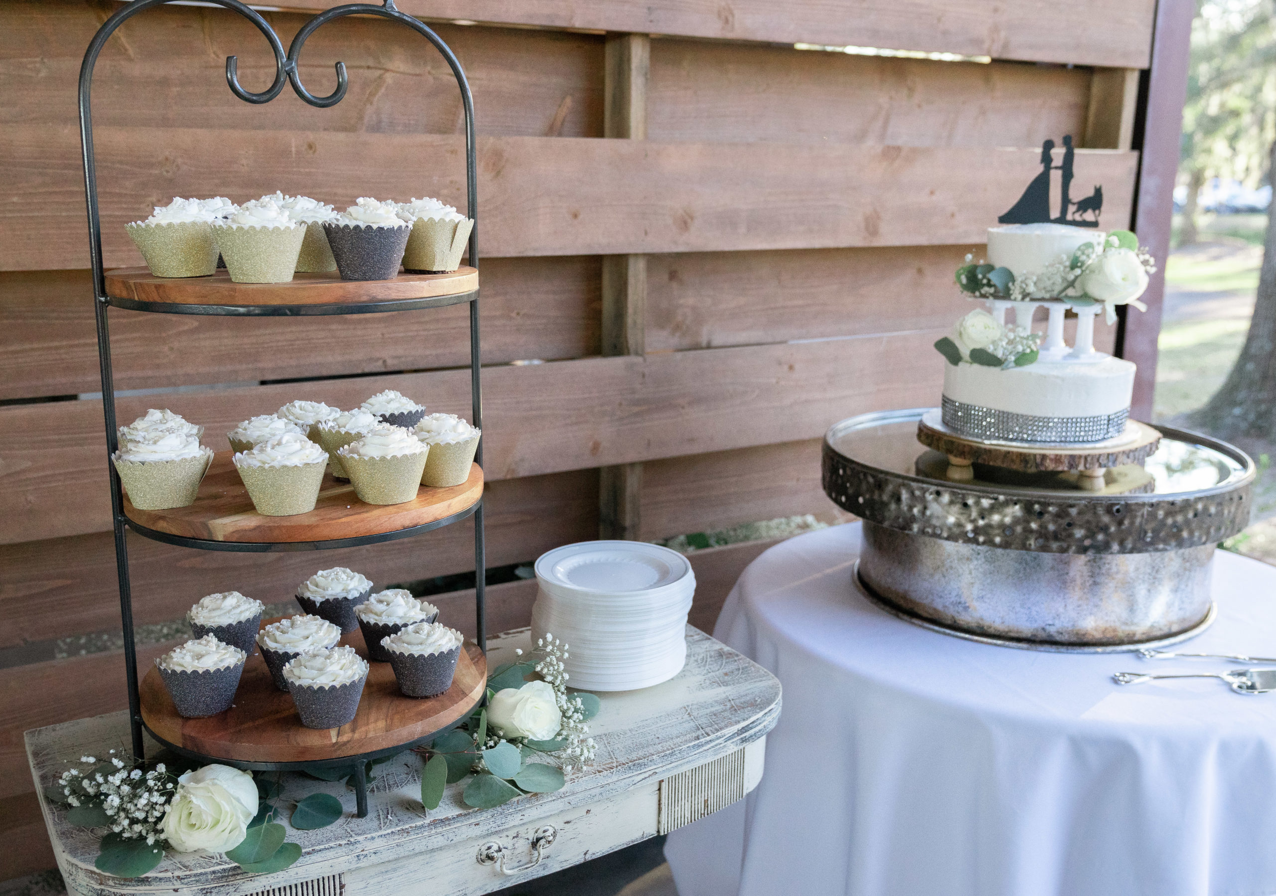 wedding cake and cupcakes 